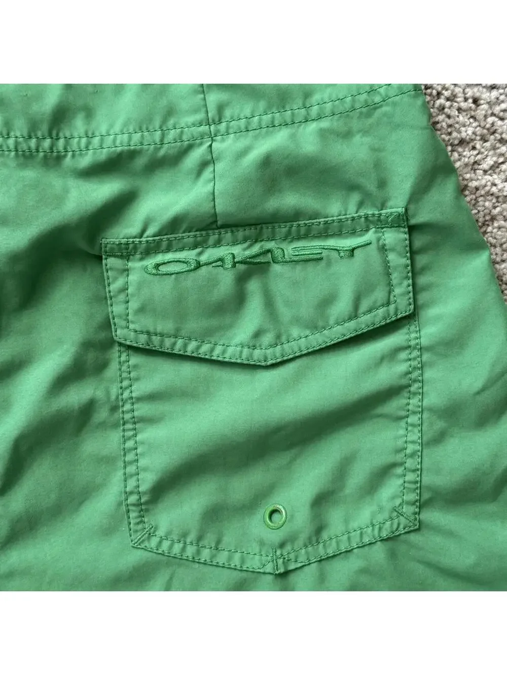 Y2k Green Oakley swim trunks with drawstring waist